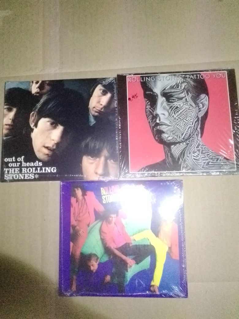 Rolling Stones quadro e CDs novos.