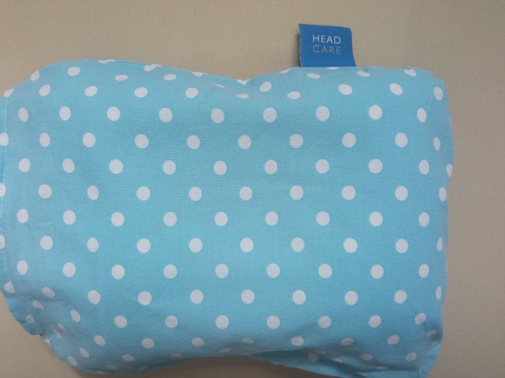 Poduszka dla niemowląt kształtująca główkę dziecka (jak nowa)
