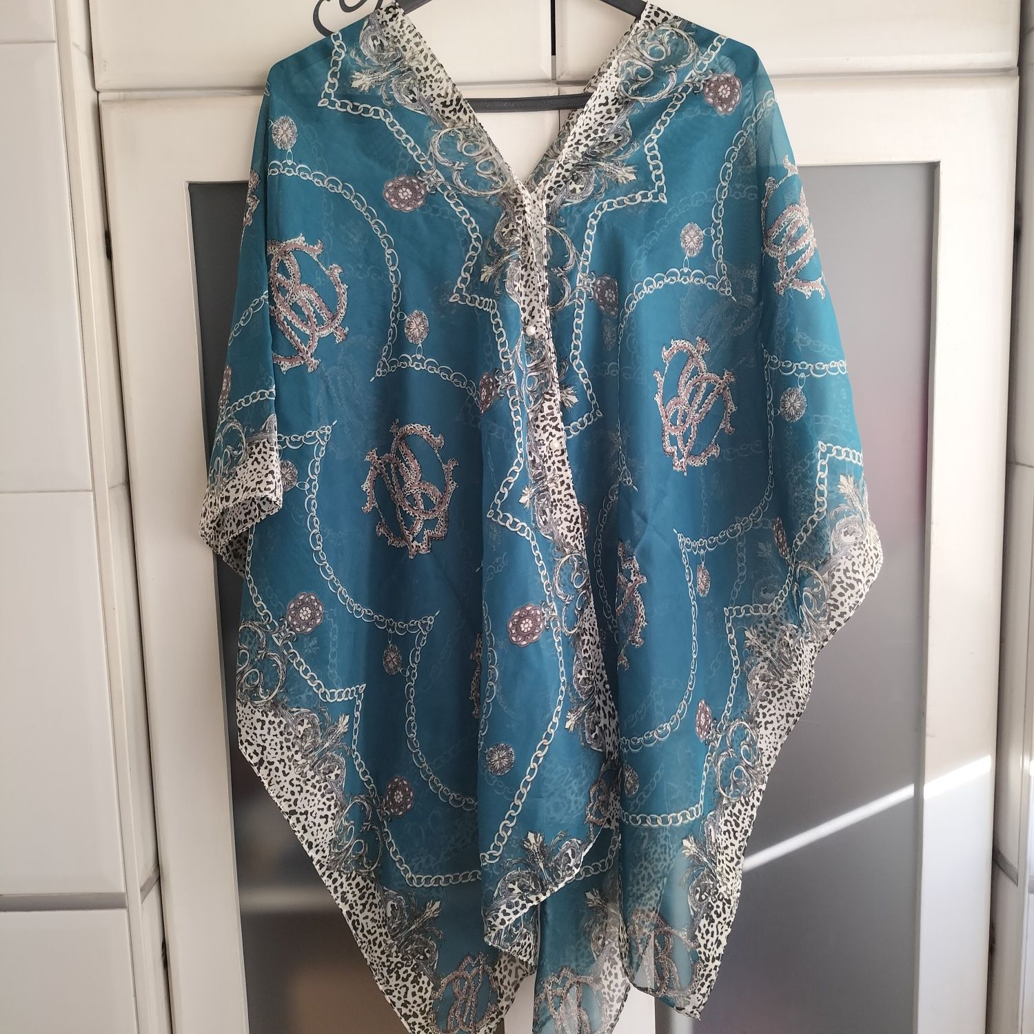 Túnica azul ciano tamanho único