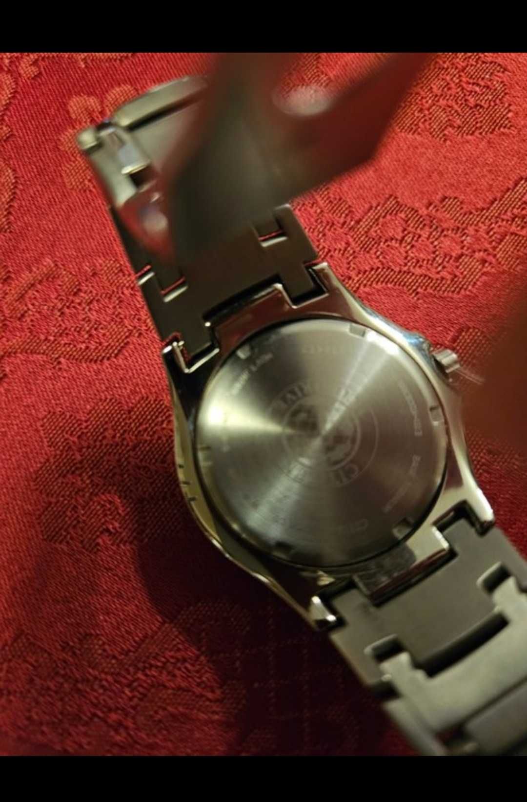 Citizen Eco Drive WR 100 Titanium w bardzo dobrym stanie z pudełkiem.