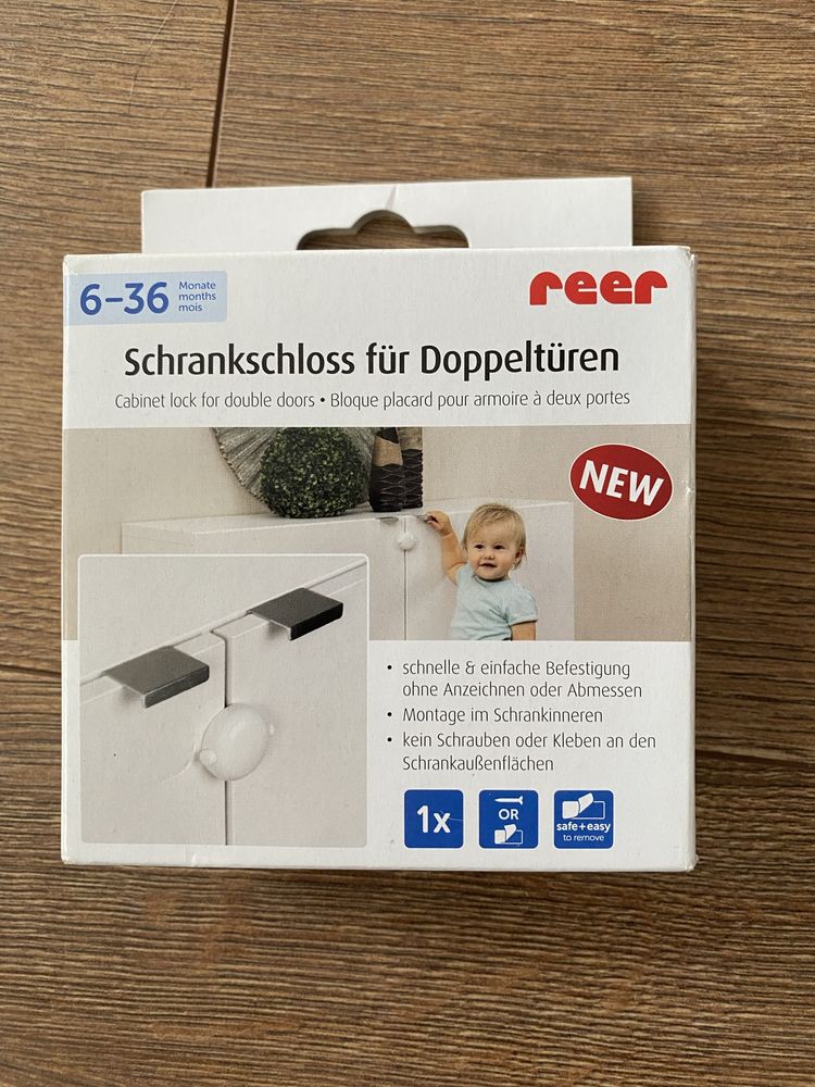 Zabezpieczenie drzwiczek Reer RE-71020 białe