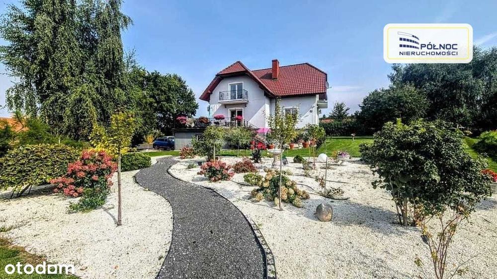 Atrakcyjny dom z piękną działką w Nowogrodźcu