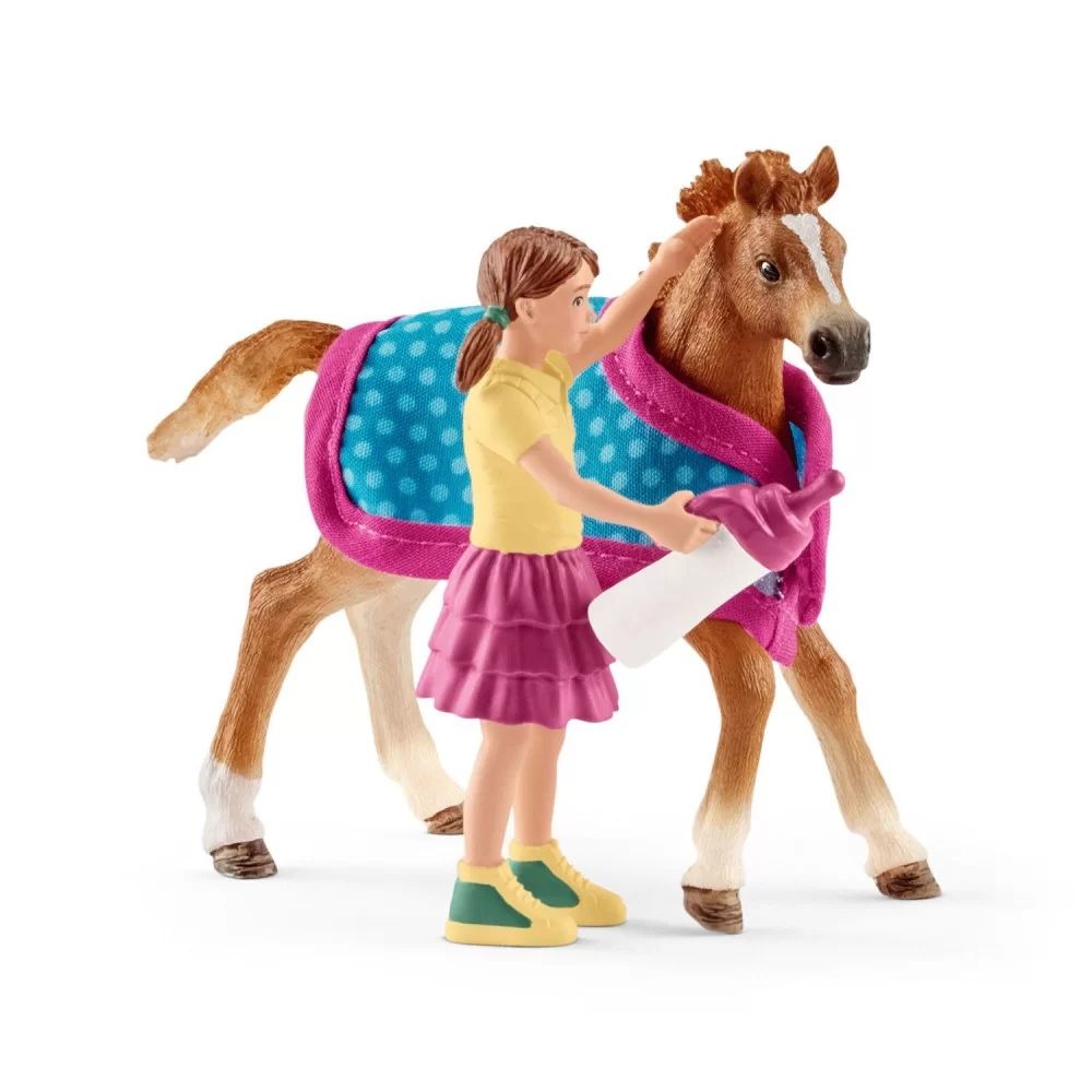 Zestaw schleich 42361- Źrebak z dziewczynką i derką