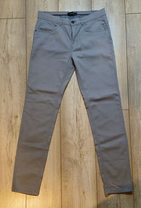 Spodnie męskie slim Reserved rozm. 30