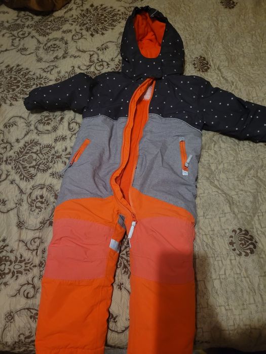 Продам зимний комбинезон Тополино размер 92