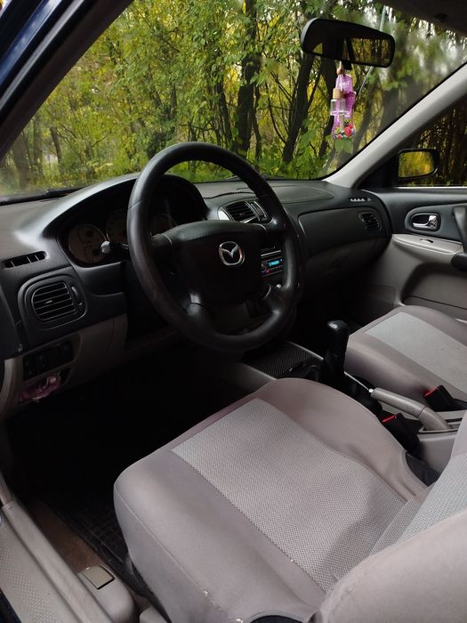 Продаж авто Mazda 323F
