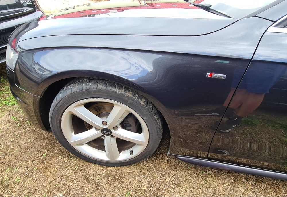 LEWY BŁOTNIK przedni przedlift przód AUDI A4 B8 2009r LZ7L