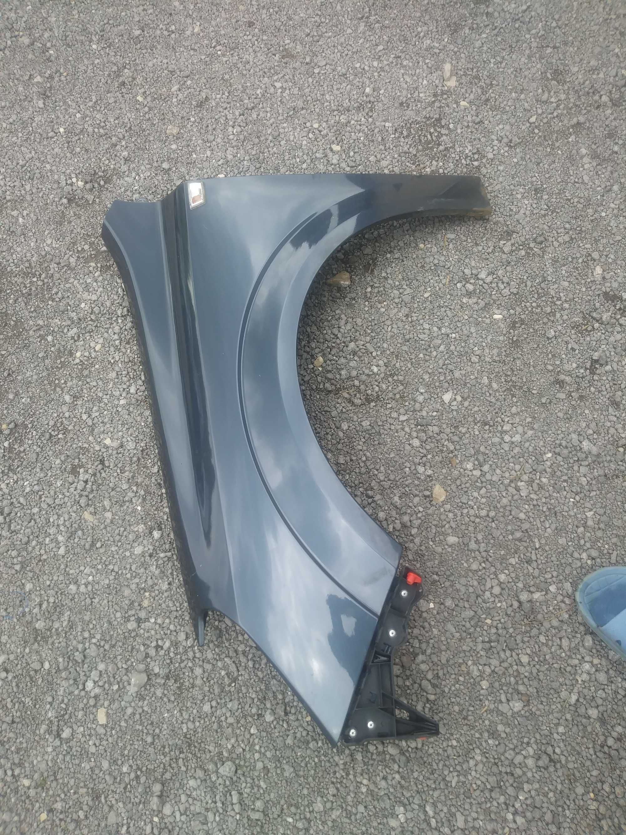Opel Astra H Błotnik Lewy przód przedni kolor Z168