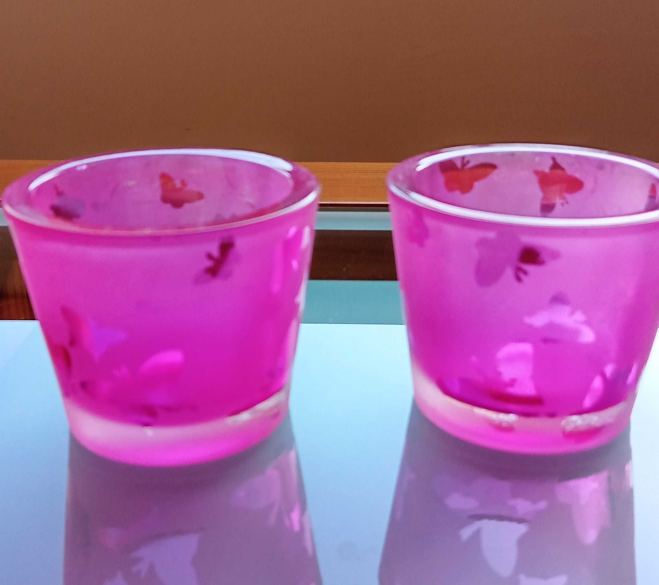 Porta velas  em vidro (rosa choque) 3€ os dois.