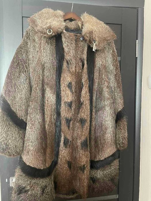 Шуба з нутрії расклешонная