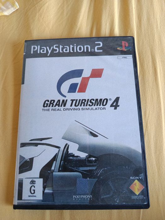 Jogo de PlayStation 2 novo gran turismo 4
