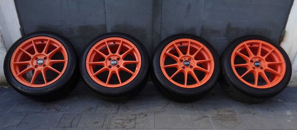 Pomarańczowe alufelgi OZ 17 cali 4x100 Opel, Toyota, Kia, Honda, opony