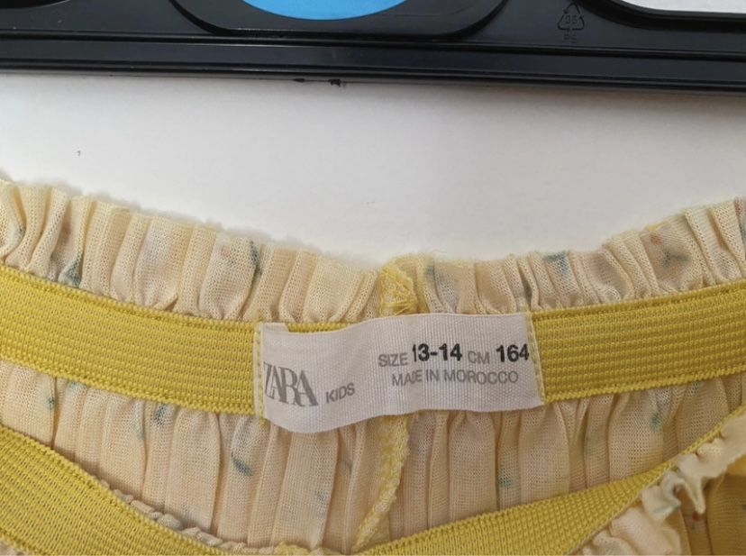 Calça plissada floral