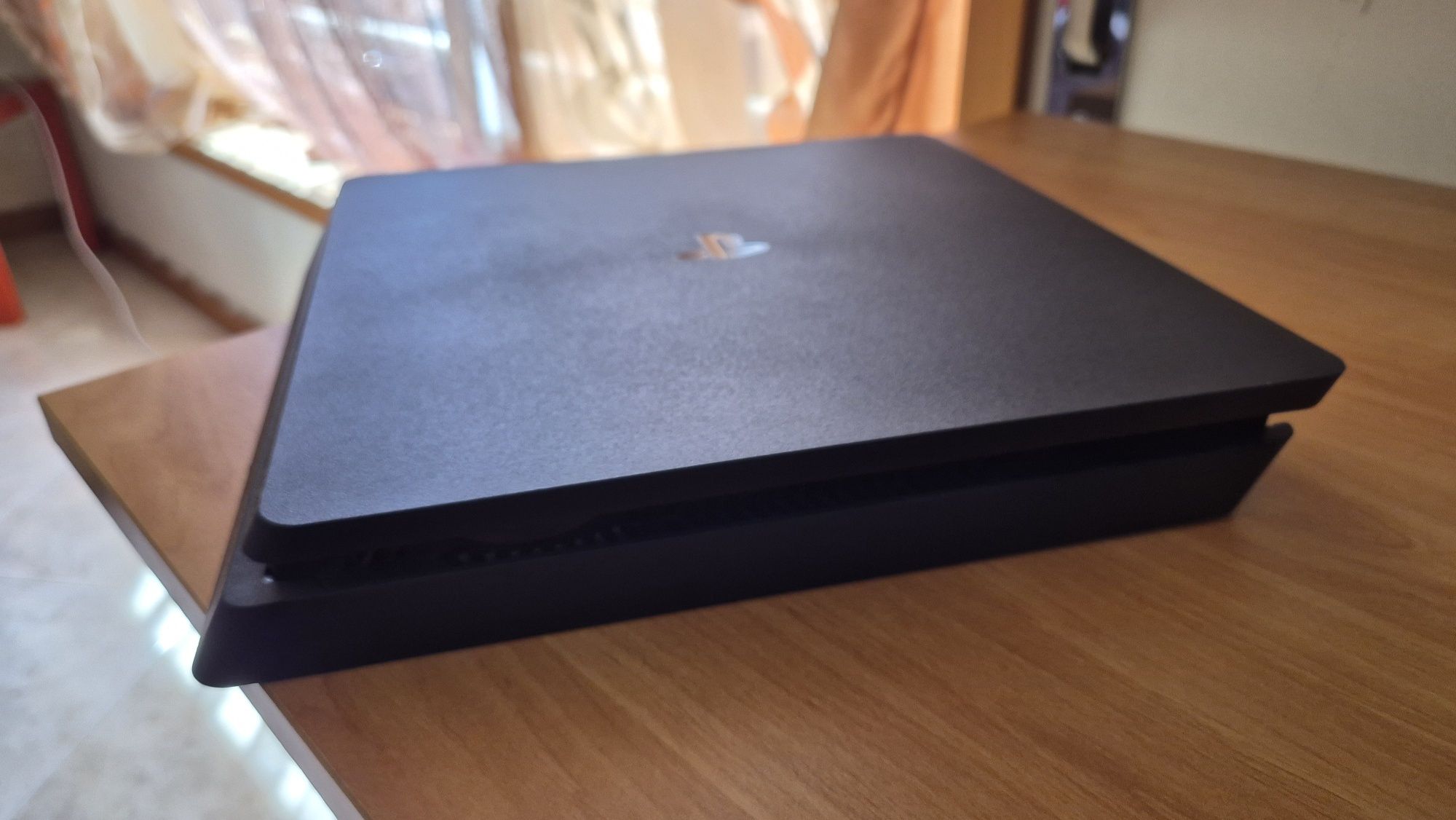 Vendo PS4 Slim 500gb com extras