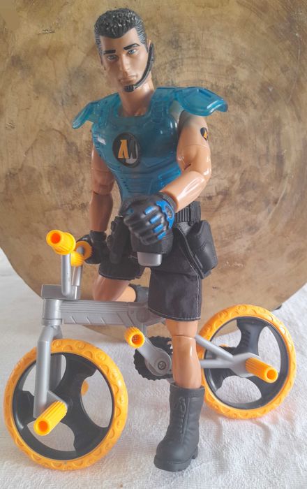 Action man  com bicicleta 1990