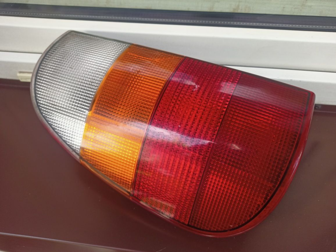 VW Caddy II 2 Seat Inca lampa tył tylna prawa wkład oprawka