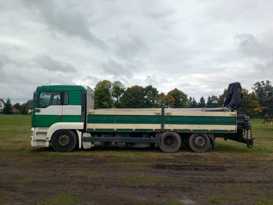 Ciężarówka MAN TGA trzyosiowy z osią podnoszoną