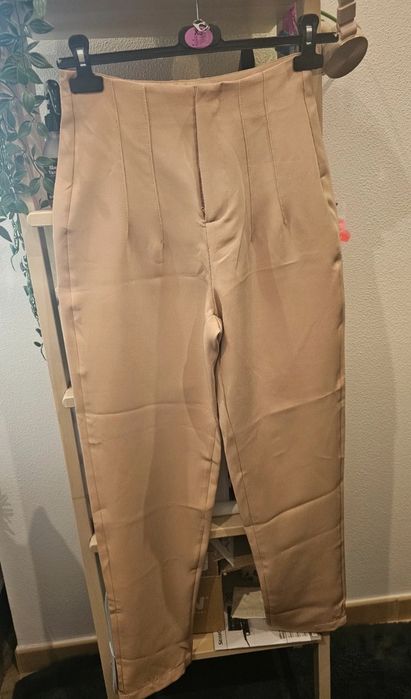 Calças cremes finas