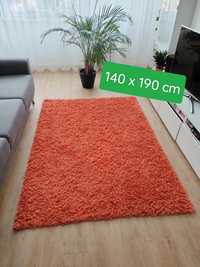 Piękny pomarańczowy dywan Anew Shaggy 140x190 cm długi włos 5cm