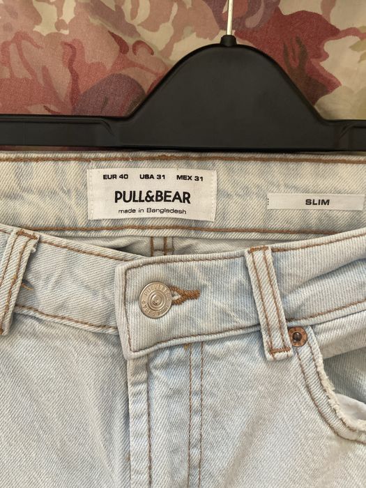 Calças de ganga azul claro