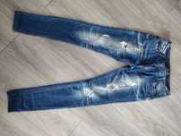 Jeansy amisu 42 dziury