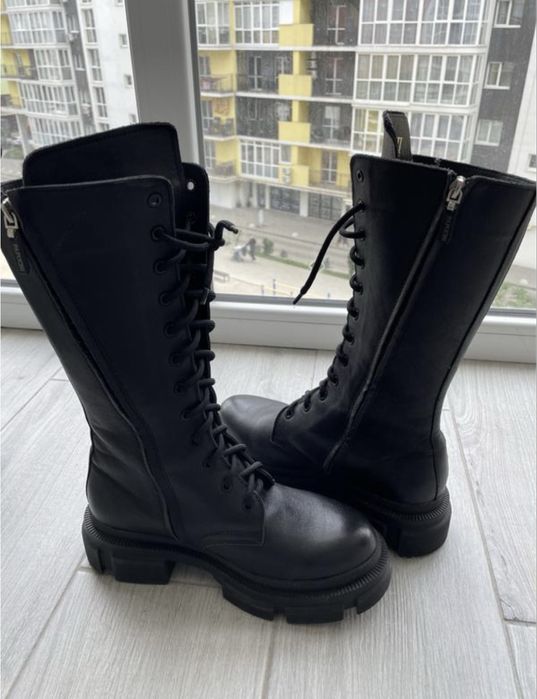 Зимові високі чоботи