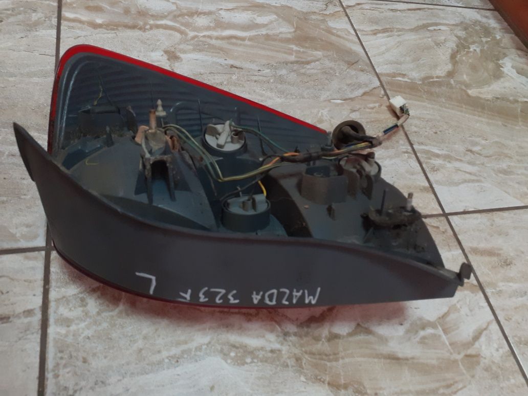 Lampa tył lewa Mazda 323F