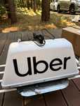 Lampa kogut Uber Taxi