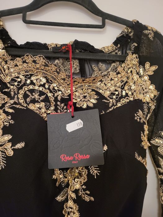 kombinezon nowy z metka