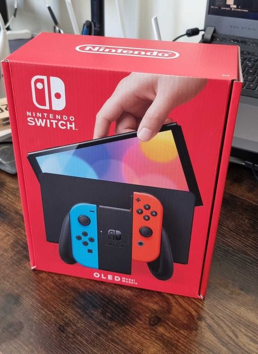 Nintendo Switch OLED + Comando [SELADA]