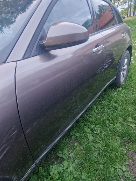 Drzwi infiniti fx35 prawe lewe tyl przod gole uzbrojone . 2005r