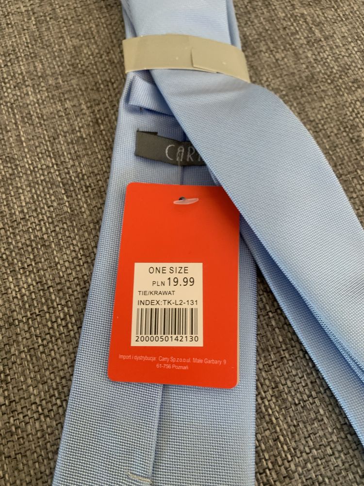 Męskie krawaty. Nowe