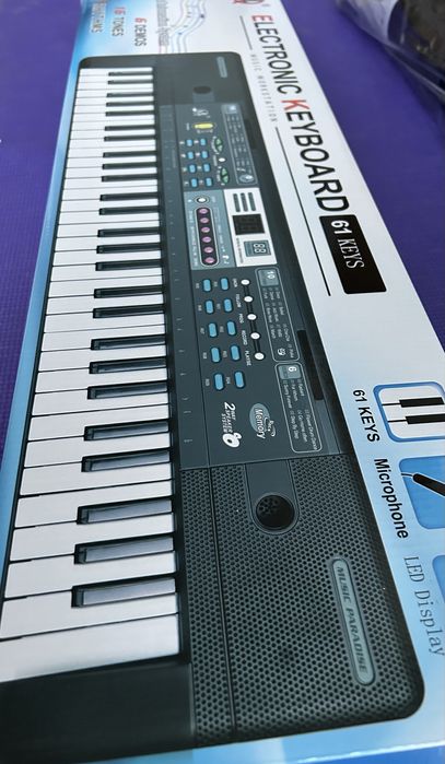 Синтезатор (новий) 61 клавиша для навчання