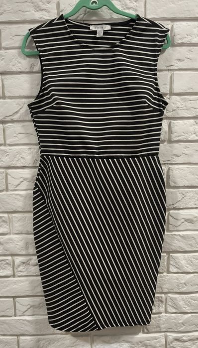 Elegancka ołówkowa sukienka firmy AMISU rozmiar 40