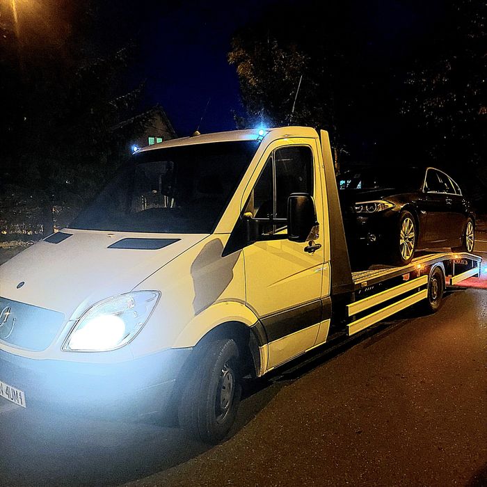 Autolaweta Laweta Transport przeprowadzki Pomoc Drogowa