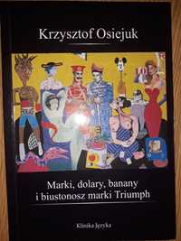 K. Osiejuk  - Marki, dolary, banany i biustonosz marki Triumph.