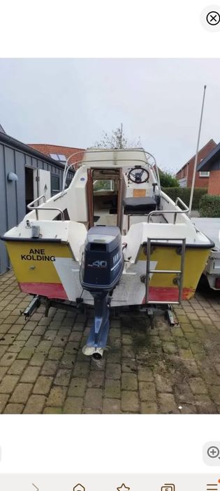 Łódka z przyczepką i silnikiem