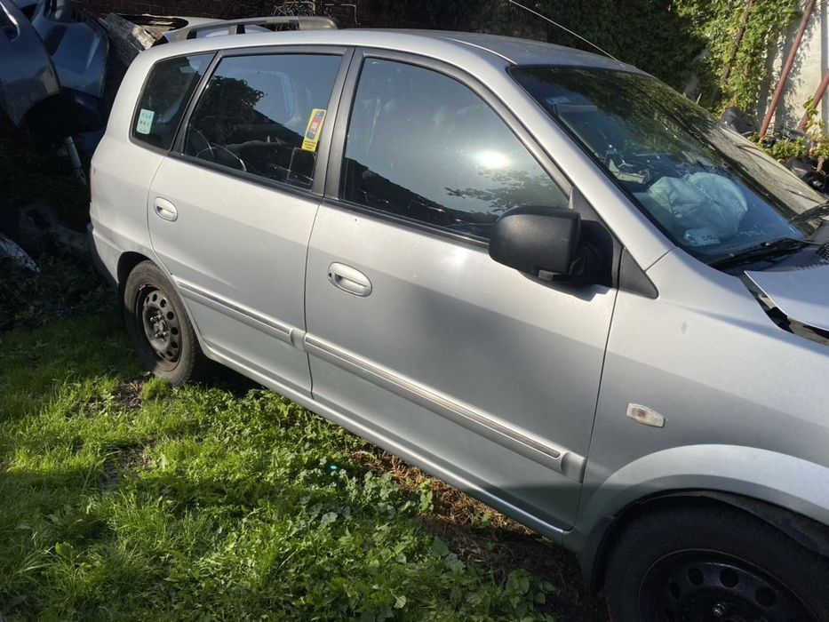 KIA CARENS II 03-06 DRZWI PRZÓD TYŁ PRAWE LEWE  KLAMKA ZAMEK PODNOŚNIK SZYBA