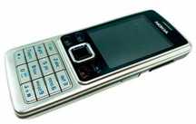 NOKIA 6300 srebrna oryginalna bateria + ładowarka
