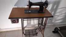 Máquina de costura singer