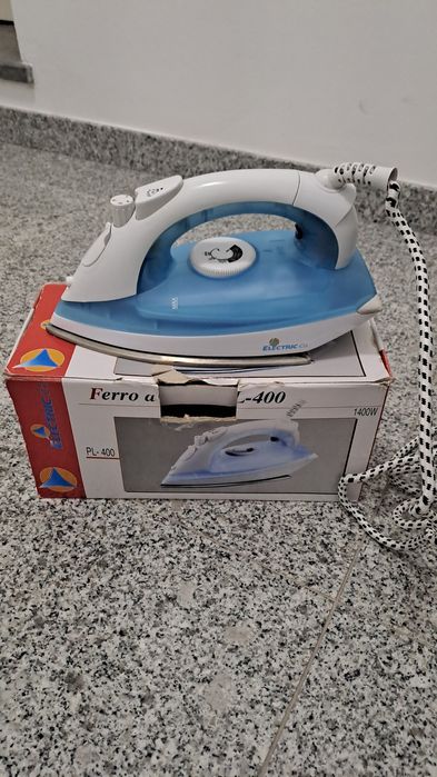 Ferro de engomar a vapor