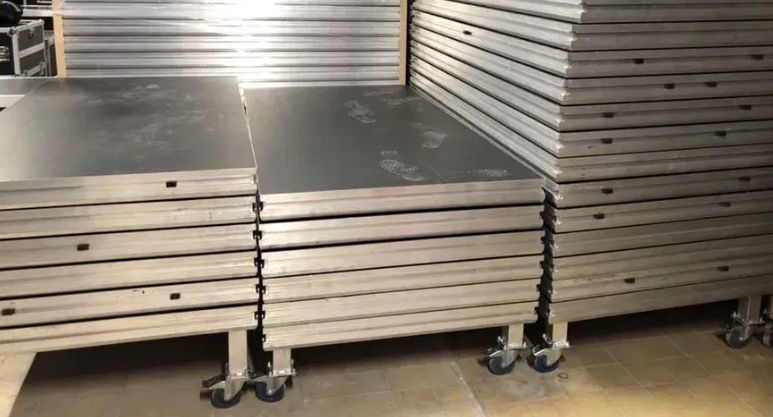 Noga z kołem do transportu podestów ALUSTAGE riser pod bębny