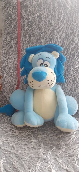 Maskotka niebieski lew