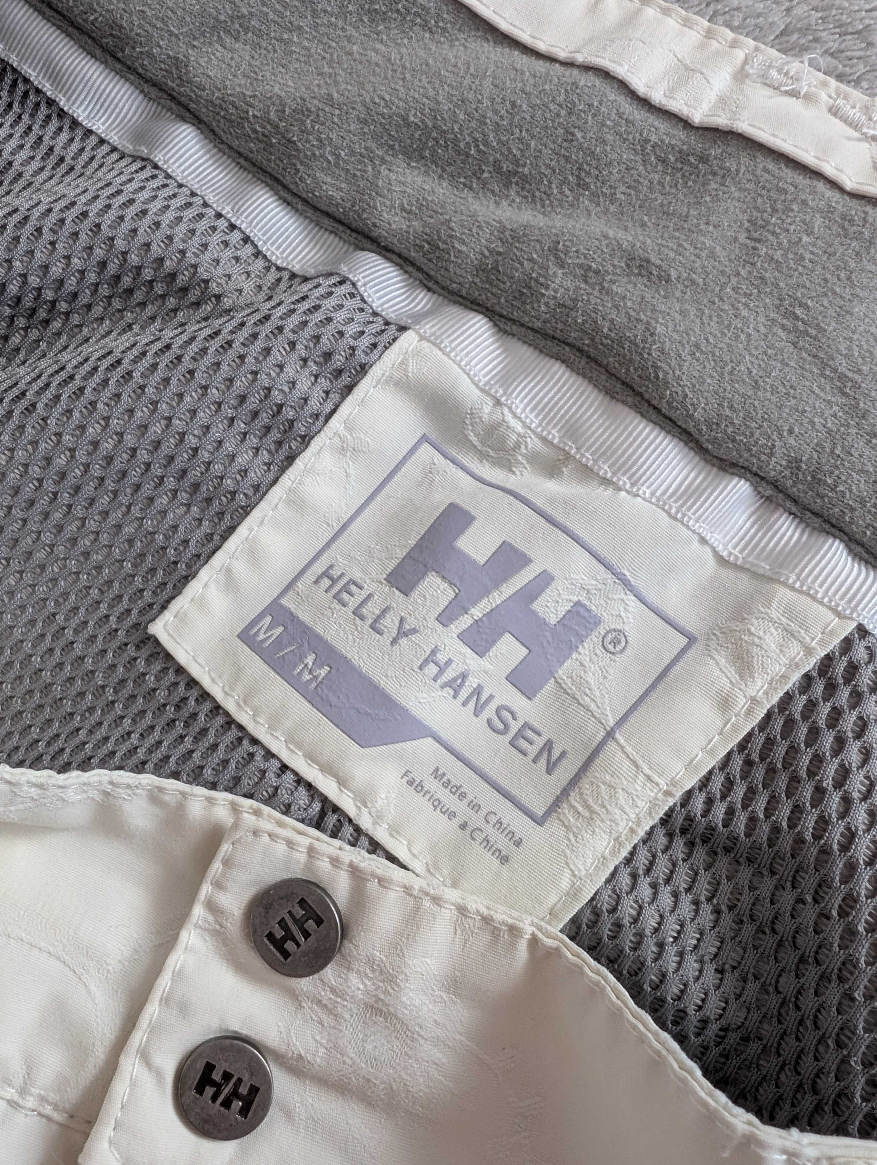 Kremowe spodnie narciarskie haftowane w kwiatki Helly Hansen Tech M 38