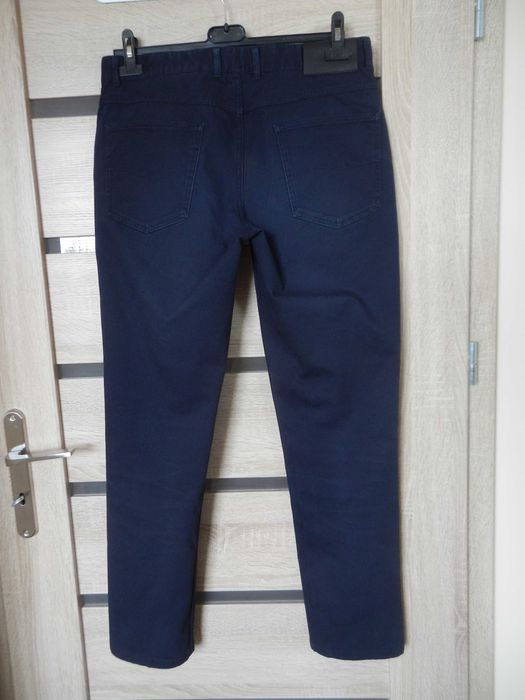 Granatowe bawełniane spodnie męskie chino r. 31