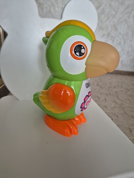Попугай-сказочник музыкальная игрушка