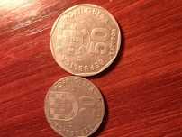 Duas moedas de 50 escudos e a outra é de 20 escudos pessoal  coleciona