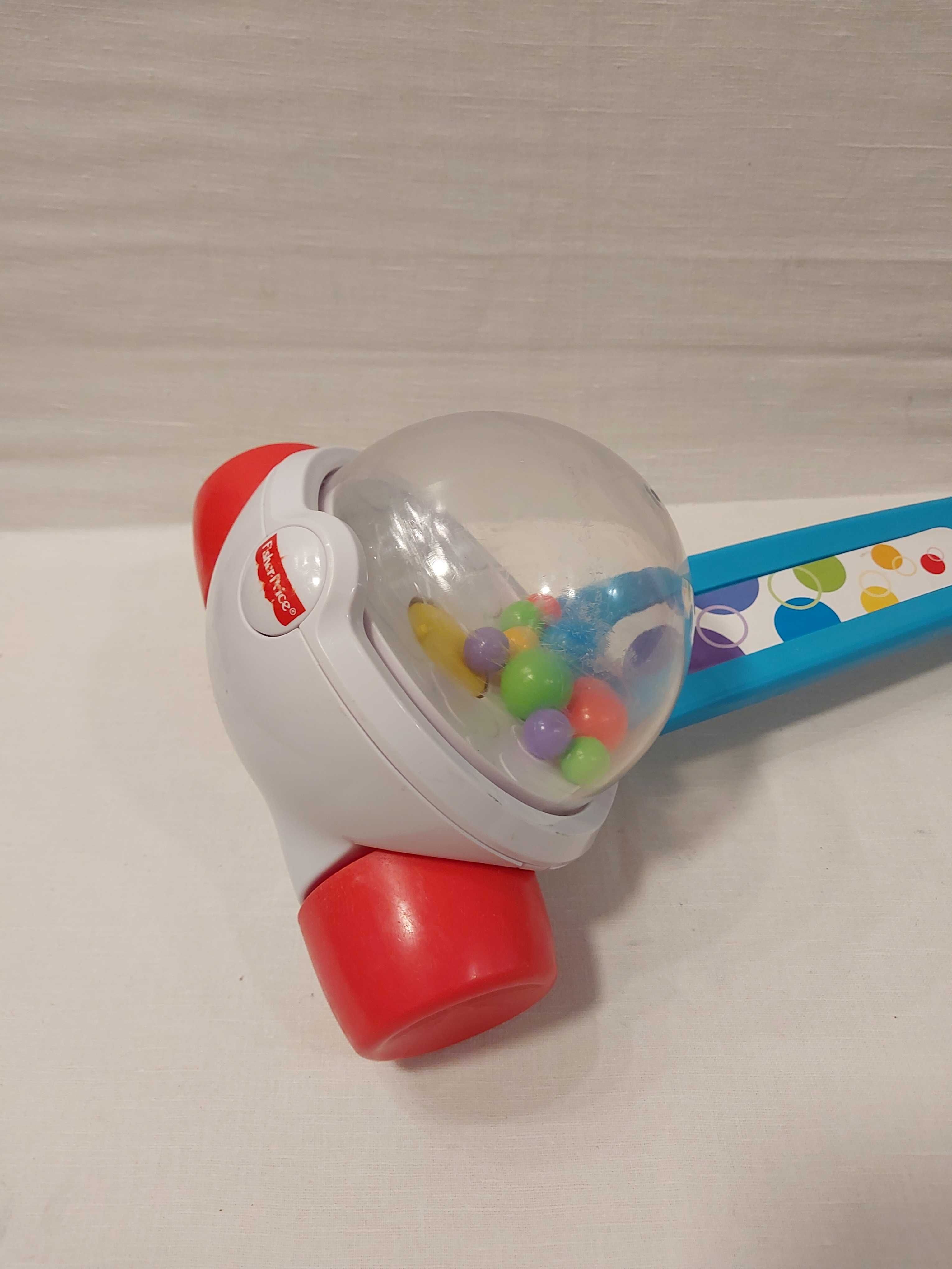 Fisher Price_Pchacz/ jeździk z podskakującymi kulkami