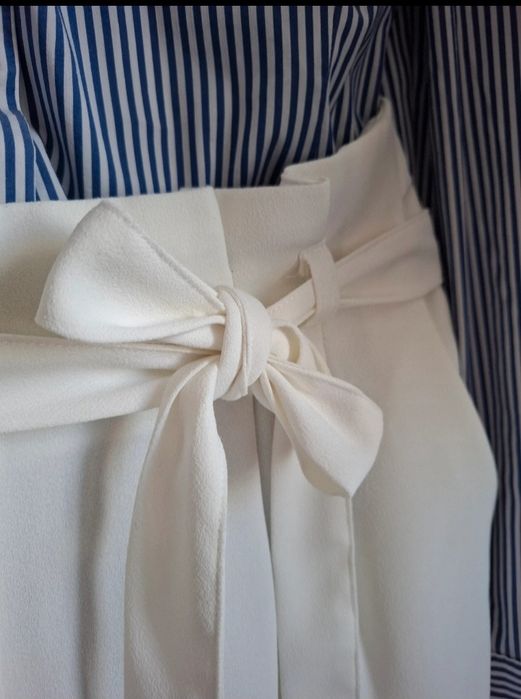 Chinosy śmetankowe roz.40