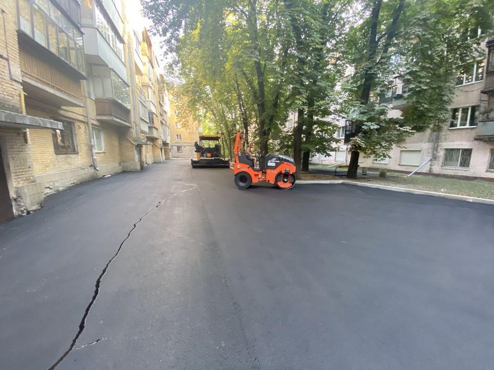 Каток бобкет , Асфальтирование дорог укладка ссфальт асфальтной крошка